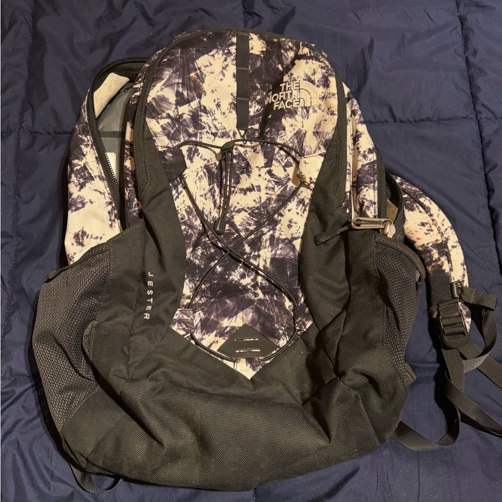 The North Face Black, Cream, and Purple Backpack
